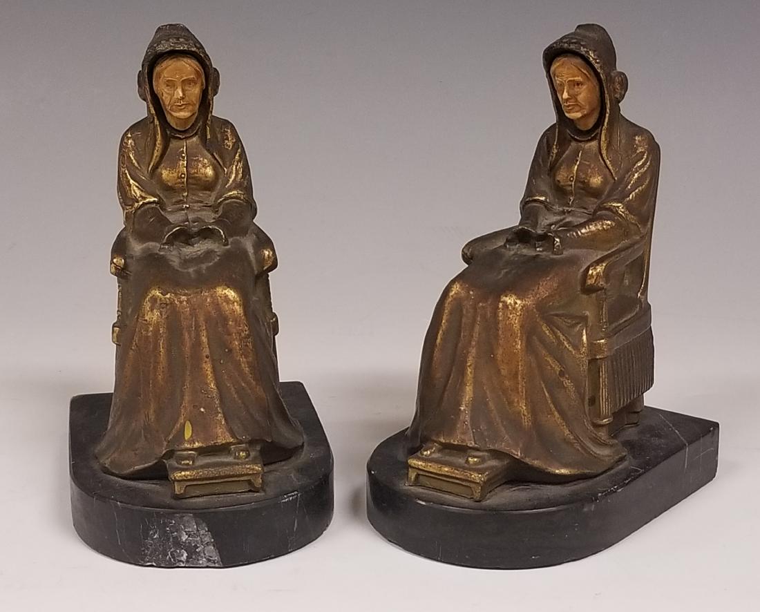 Pair of JB Hirsch Whistlers Mother Bookends: Dating to 1932, these were made by the firm of Joseph B Hirsch in NY circa 1932. Bronzed finish spelter, marble bases and "ivorine" faces. Dimensions are: 6 1/2" tall X 3 1/2" wide X 4 3/4" deep. All 