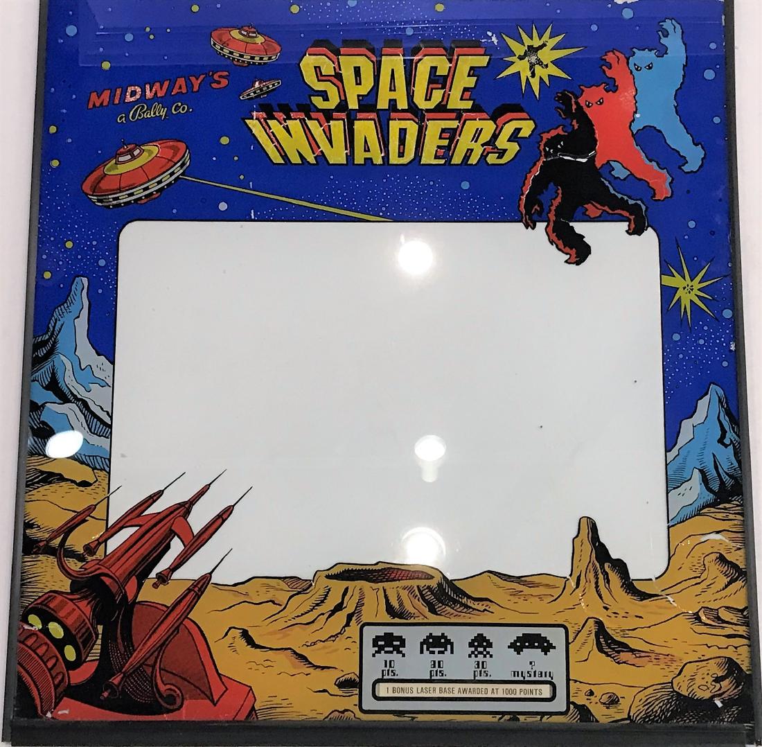 Space Invaders Coin Op Machine Front Glass: Colorful glass insert panel. Dimensions are: 24 7/8" wide x 26 3/8" tall. All measurements are approximate. Condition: Some paint chipping, wear.
