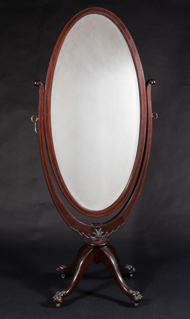 Antique Empire Cheval Dressing Mirror: Antique Empire Cheval Dressing Mirror: Circa 1900 Mahogany claw foot oval mirror with original beveled glass. Dimensions are: 73 1/2" tall x 33" wide. All measurements are approximate. Condition: Some
