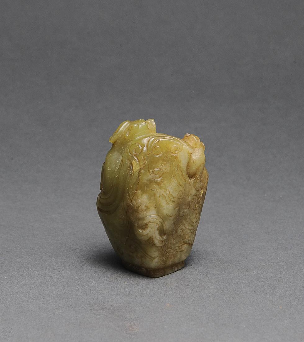 Chinese Yellow Jade Carved Censer Top,Ming Dynasty: A Chinese yellow jade carved censer lid finial dating from the Ming dynasty. The sides are carved with 2 chilong. Dimensions are: 2 3/4 inches tall X 2 1/4 inches wide. All measurements are approximat