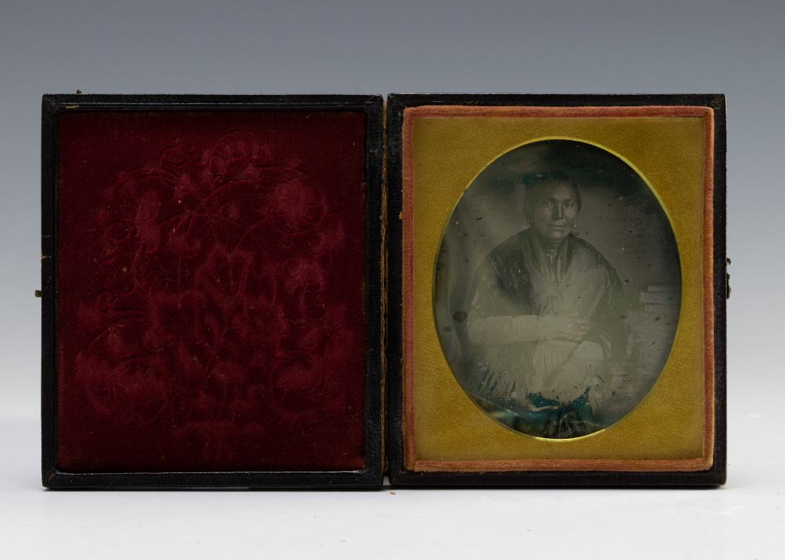 Sixth Plate Daguerreotype of a Sioux Woman: Rare 6th plate daguerreotype of a Sioux woman. Comes with a typed index card that reads: John Seymour brother of Ellen Jane Seymour (grandmother of Raleigh Johnson) married an American Indian princess