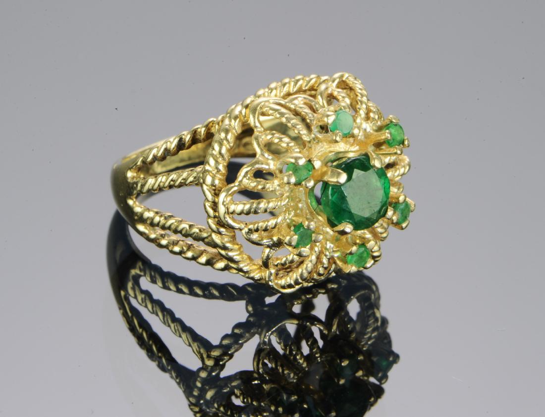 14k Yellow Gold Cocktail Ring with Emeralds: 14k Yellow Gold Cocktail Ring with Emeralds: The rope-form setting with seven, prong set emeralds. Dimensions are: size 6.25, weight: 7.6 g, .24 dwt. All measurements are approximate. Condition: Free 