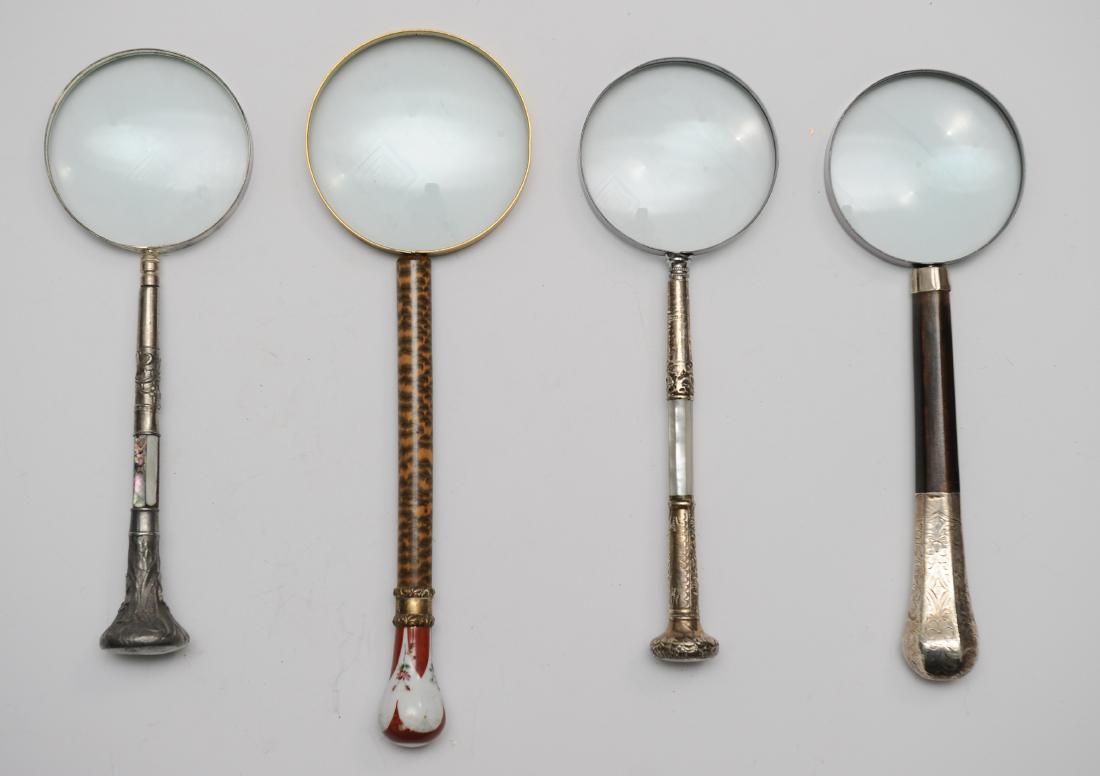 (4) Magnifying Glasses Inc Sterling Silver Handles: (4) Magnifying Glasses Inc Sterling Silver Handles: Four magnifying glasses with handles made from cane tops. Two are signed 925 sterling, one of which has a monogram A.T. on the end. One is made from