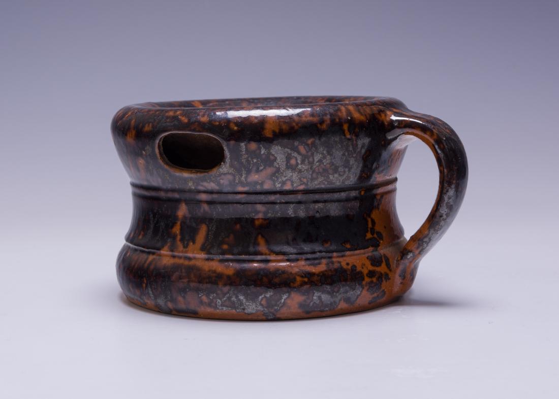 John Bell Waynesboro Redware Cuspidor: John Bell Waynesboro Redware Cuspidor: Scarce small handled redware cuspidor or spittoon with a lead and manganese glaze by John Bell in Waynesboro, Pennsylvania. Stamped on bottom 'John Bell Waynesbo