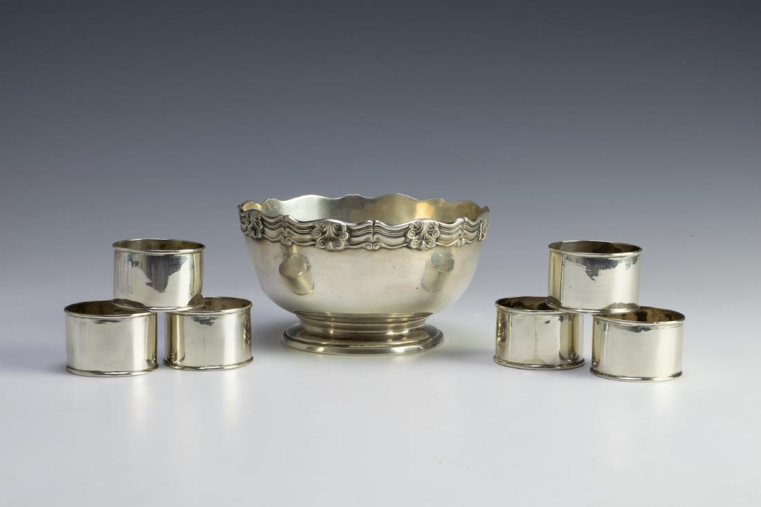 (7) Sterling Bowl London Import Mark & Napkin Ring: Sterling silver bowl and napkin rings. Bowl is dated 1905 with London import mark, pattern no. 205, hallmarked AWF an unknown maker that were sometimes sold by Tiffany & Co. Also comes with six sterli