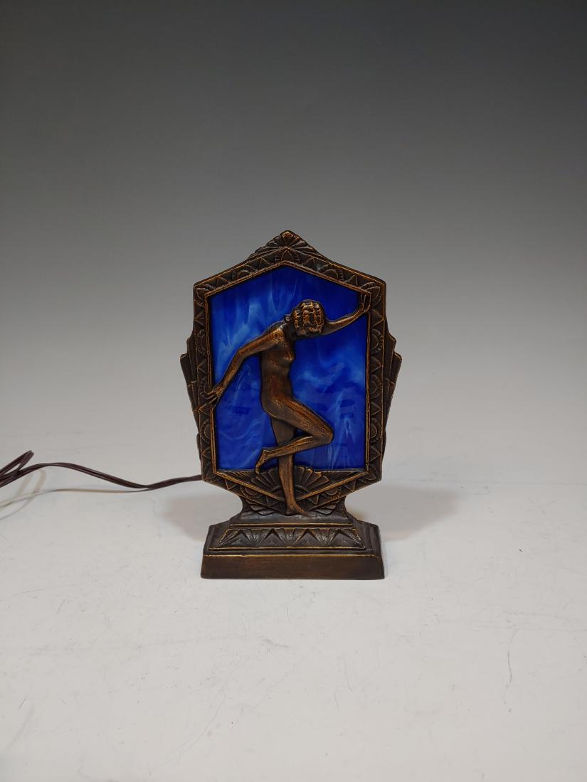 Art Deco Lamp: Paul Sahlin Tiffany's Art Deco stained glass and cast zinc lamp with antique brass finish. Dimensions are: 9" high X 5 3/4" long X 3 3/4" wide. All measurements are approximate. Condition: Lamp not te