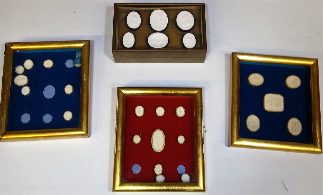 (4) Framed Grand Tour Plaster Seal Groups, Box: Three plaster seal groups are mounted and framed, and one plaster group is set in the glass top of a metal and wood box. Collected as souvenirs during grand tours of Europe during the 19th century. Di