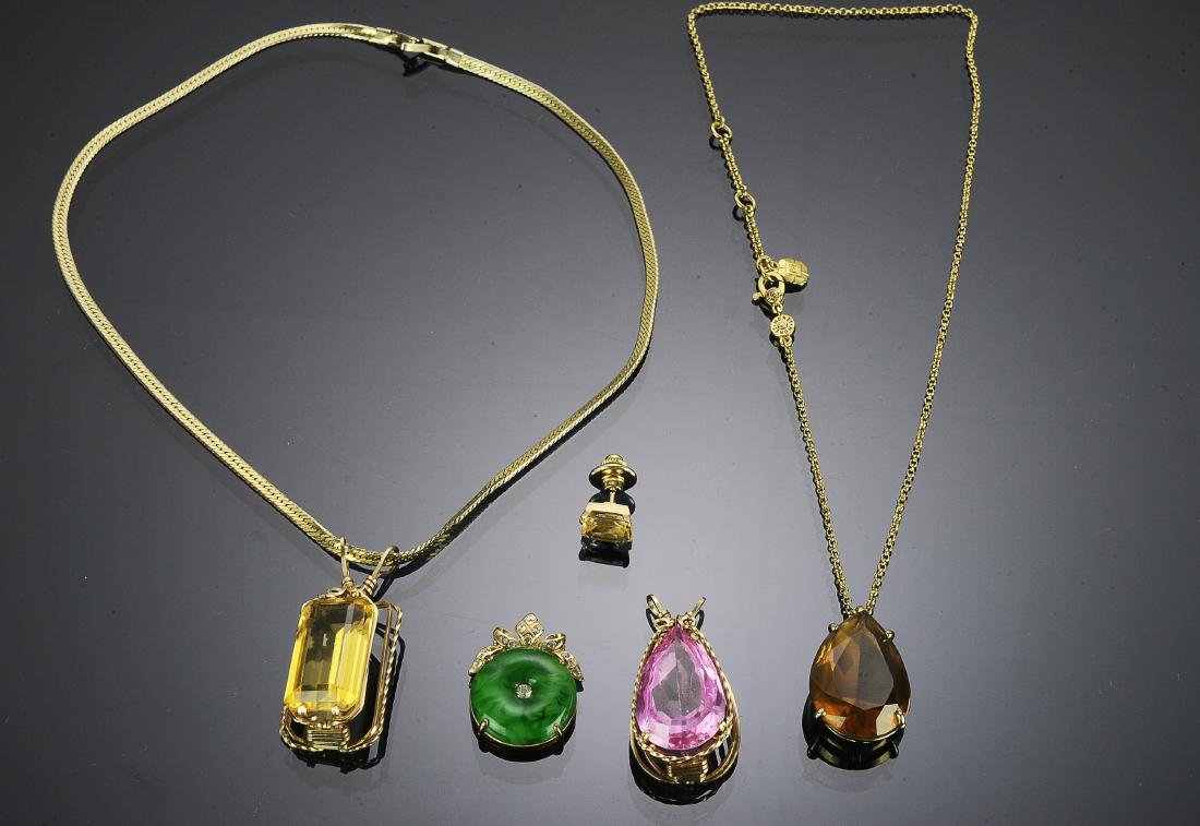 Semi-Precious Gemstone Jewelry: An emerald cut citrine pendant, approximately 25 carats, citrine tiepin approximately 3 carats, a colored glass pendant by Monet and an 18K gold plated glass faux jade and paste pendant. Dimensions ar