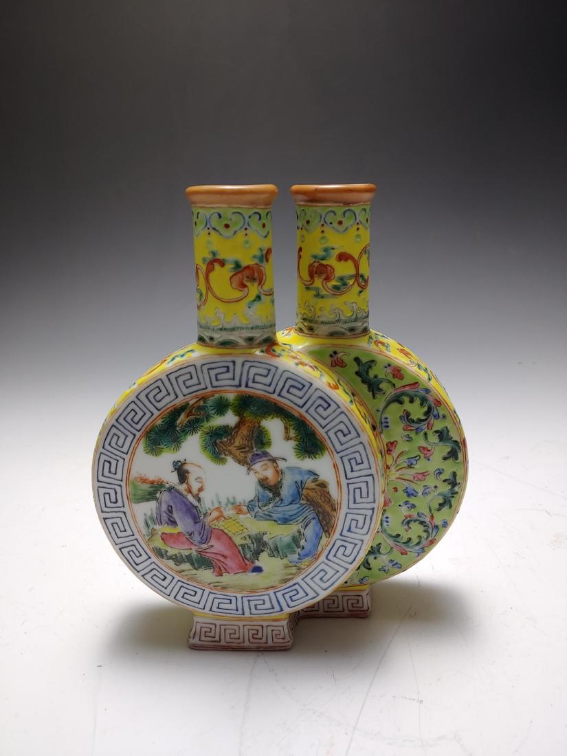 Chinese Famille Rose Double Moon Flask: Chinese famille rose double moon flask, Qianlong Period Make mark on base. Likely mid-20th century reproduction of 18th century Imperial porcelains. Dimensions are: 7 5/8 inches high X 6 inches long X