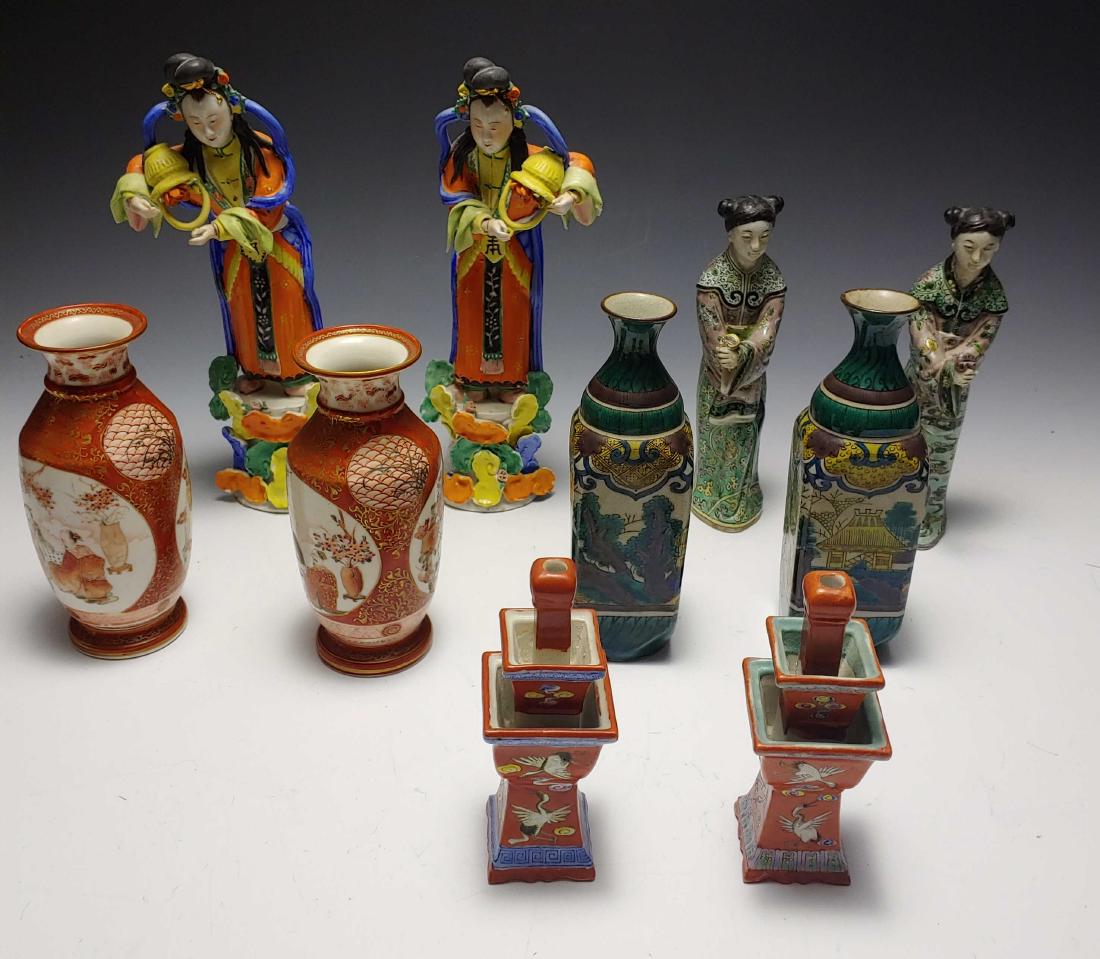 (5 Pairs) Chinese and Japanese Ceramics: 5 Pairs Chinese and Japanese Ceramics: China, 19th - 20th century. a) Pair of Chinese export ceramic figures in orange robes upending basket of flowers, with China mark on back of base; b) Pair of Chi