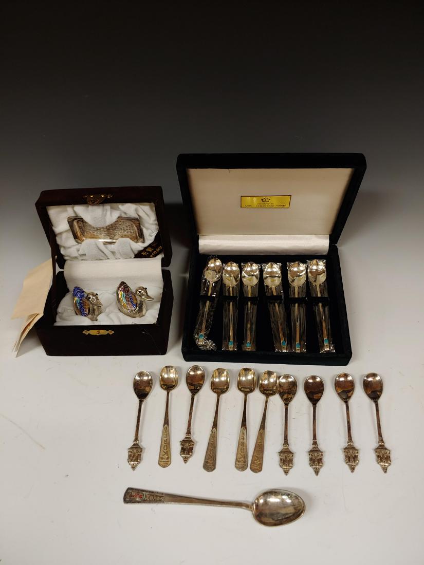 (19) Pcs Sterling & Silver Vertu Thailand & Korea: (19) Pcs Sterling & SIlver Vertu Thailand & Korea: Includes a) presentation gift from Chun Doo-hwan of six blue enamel tipped, sterling silver tea spoons. Housed in a dark green velvet box with engrav