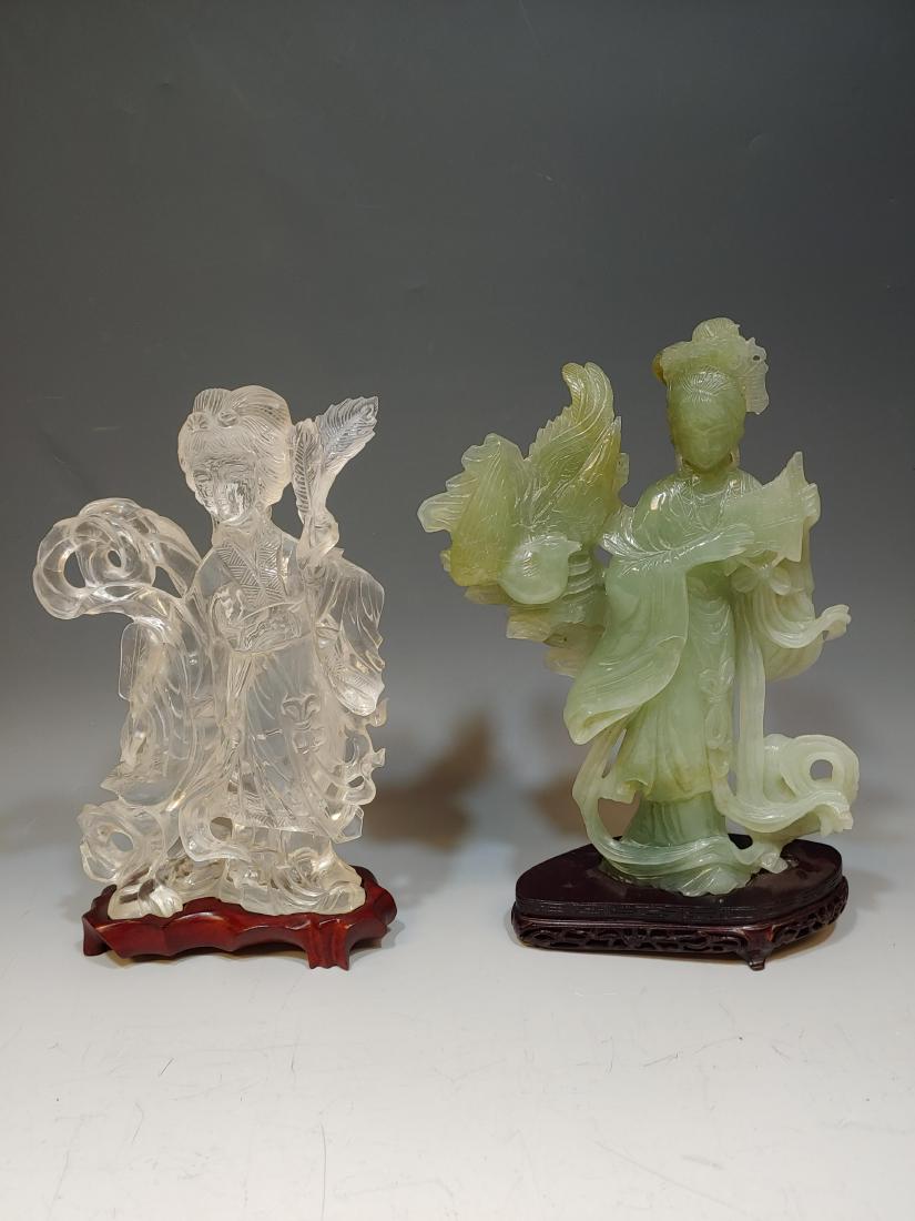 (2) Chinese Rock Crystal & Jade Court Ladies: (2) Chinese Rock Crystal & Jade Court Ladies: China, 20th century. Two large stone carved Chinese style court ladies. One carving is in rock crystal or clear quartz and depicts a woman holding a fan a