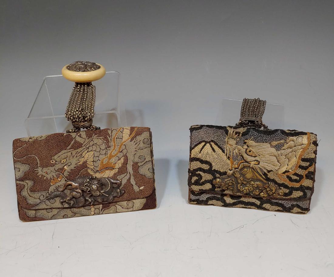(2) Japanese Meiji Era Tobacco Pouches with Dragon: (2) Japanese Meiji Era Tobacco Pouches with Dragon: Needlework tobacco pouches or kinchaku, one with silver mounted dragon clasp and ivorine toggle, the other with brass dragon clasp in front of Mt. F