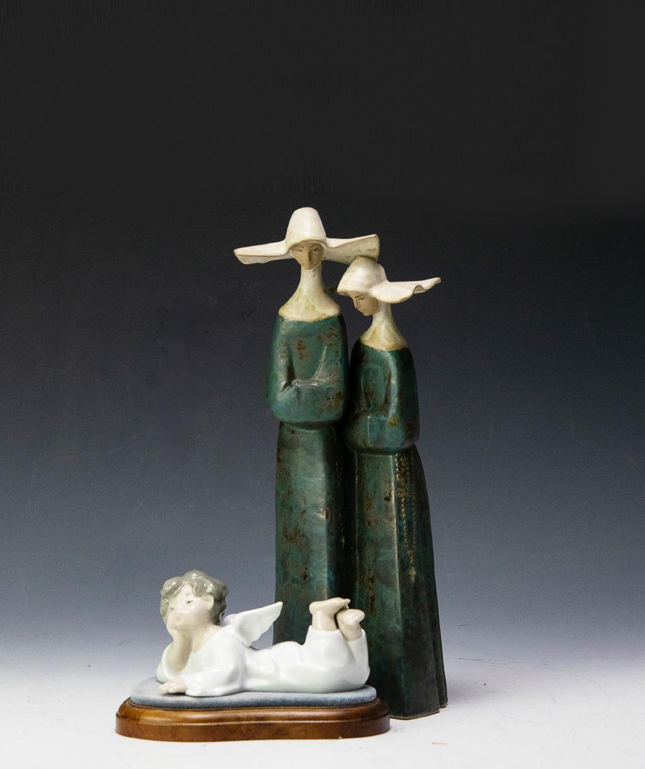 (2) Lladro Porcelain Nuns 2075 & Angel 7938: (2) Lladro Porcelain Nuns 2075 & Angel 7938: Spain, 20th century. a) Lladro porcelain Nuns 4621 model in blue and white habits, gres finish. Maker's mark on base. Sculpted by Fulgencio Garcia, release
