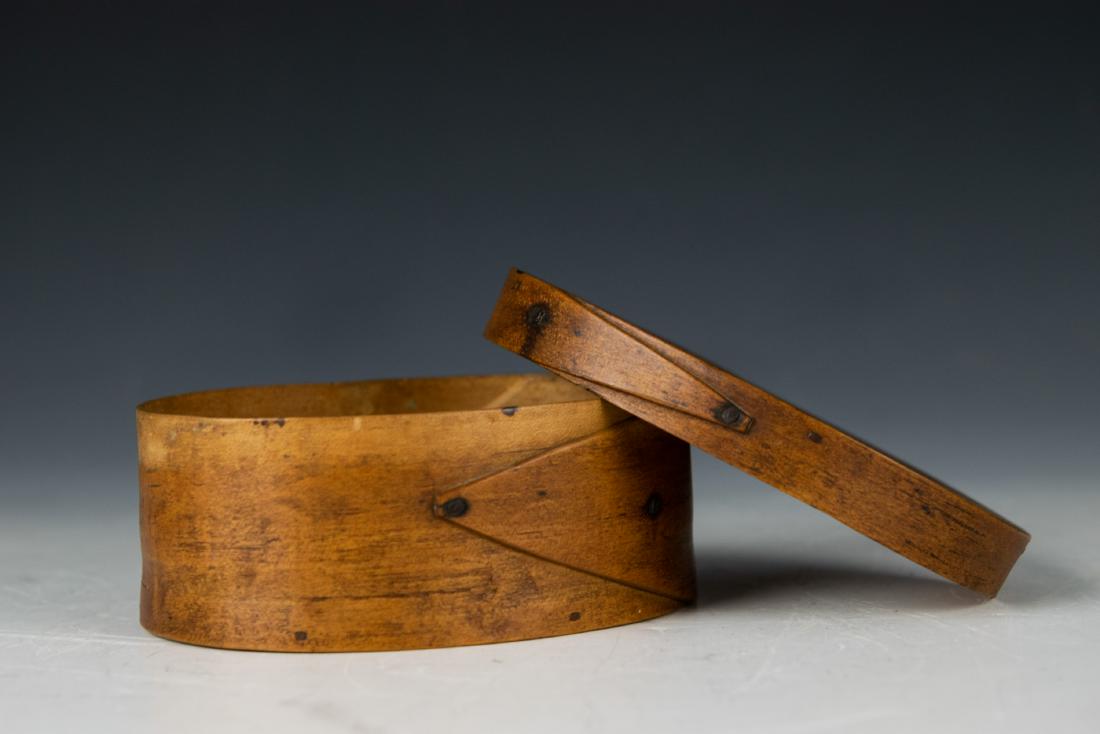 Signed 19th Century Shaker Oval Pantry Box: 19th century Shaker oval pantry box. Original finish, signature/mark impressed into wood "I. Whiton." Lid is also marked Ginger. Likely from the New Hampshire area. Dimensions are: 6 1/2 inches long X