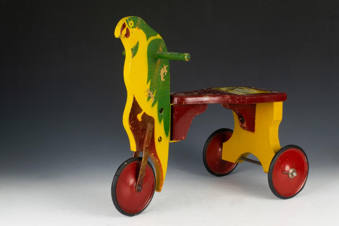 Poll Parrot Shoes Advertising Toy Tricycle: Poll Parrot Shoes advertising toy tricycle. Gundelfinger mark on back: "The Gundelfinger Wood Prod. Co St. Louis Jefferson City." Dimensions are: 19 inches long X 11 1/2 inches wide X 17 inches high. 