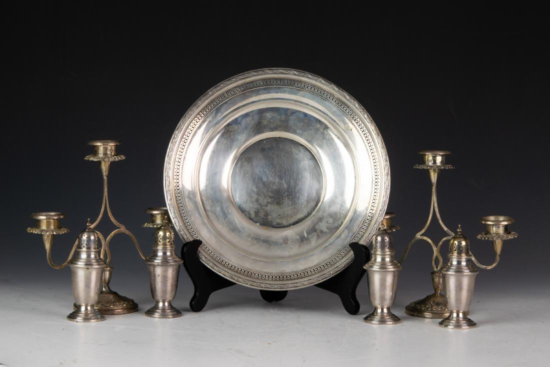 (7) Sterling Silver Salt & Pepper & Platters: (7) sterling silver salt & pepper, tray & basket: a) sterling silver platter with bands of reticulation, beading and foliage. Impressed with, 'STERLING 23' and maker's marks; b) (4) Gorham sterling si