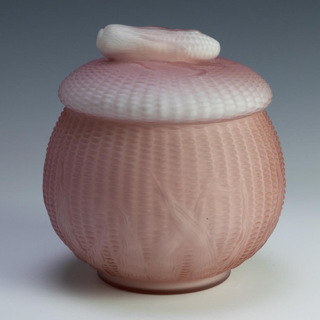 New England Glass Co. Peachblow Covered Jar: Unusual covered dish peachblow by New England Glass Co. Pattern shows rows of corn kernels and leaves. Lid with kernels and an ear of corn as the handle. Dimensions are: 7 inches tall X 6 1/2 inches d