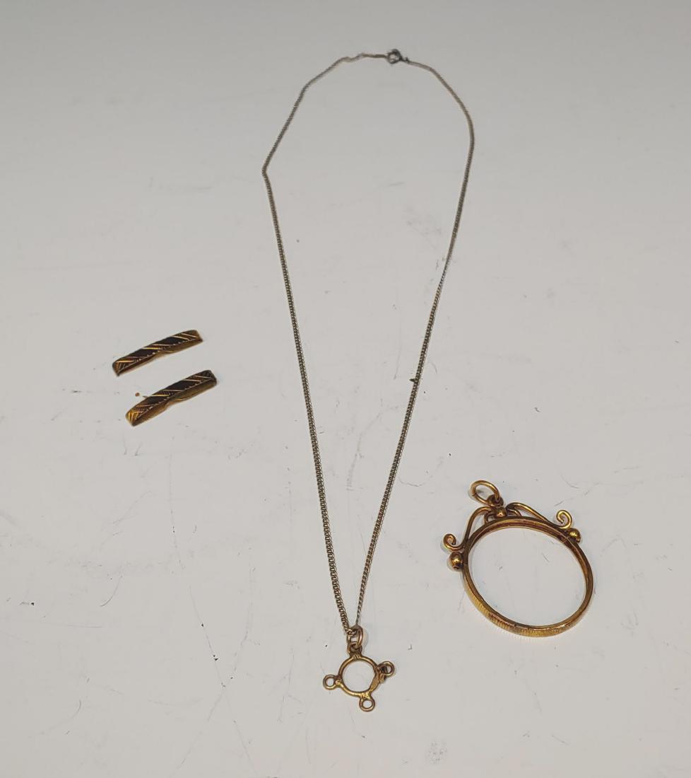 14K Gold Locket Frame, Necklace and Clips: 14K Gold Locket Frame, Necklace and Clips. Necklace is marked 14K and two clips are marked solid gold. Total Weight: 7.6 g (0.24 troy oz). Dimensions are: necklace - 10 inches long. All measurements a