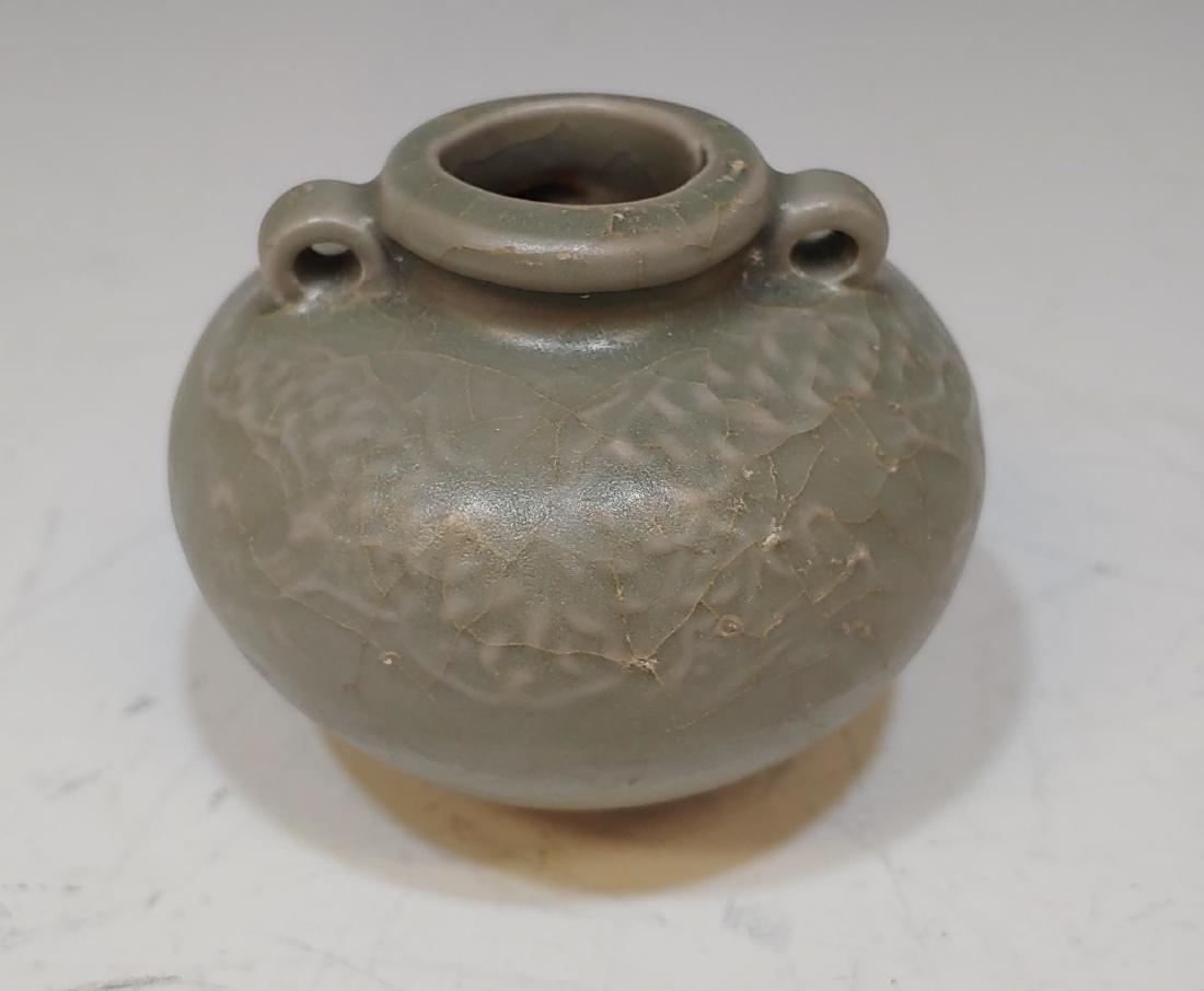 Vietnamese Ceramic Dragon Jarlet Quang Ngai: Vietnamese Ceramic Dragon Jarlet Quang Ngai: A green jarlet with a dragon on it that came from Quang Ngai, a province in Vietnam. The Ca Mau shipwreck was discovered by fishermen in 1998. The ship was