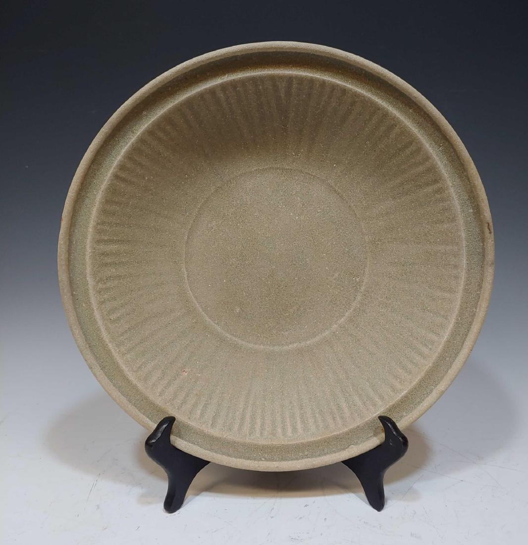 Vietnamese Ceramic Quang Ngai Platter: Vietnamese Ceramic Quang Ngai Platter: Green ceramic platter from the Quang Ngai province in Vietnam. Vietnamese Quang Ngai Platter The Ca Mau shipwreck was discovered by fishermen in 1998. The ship w