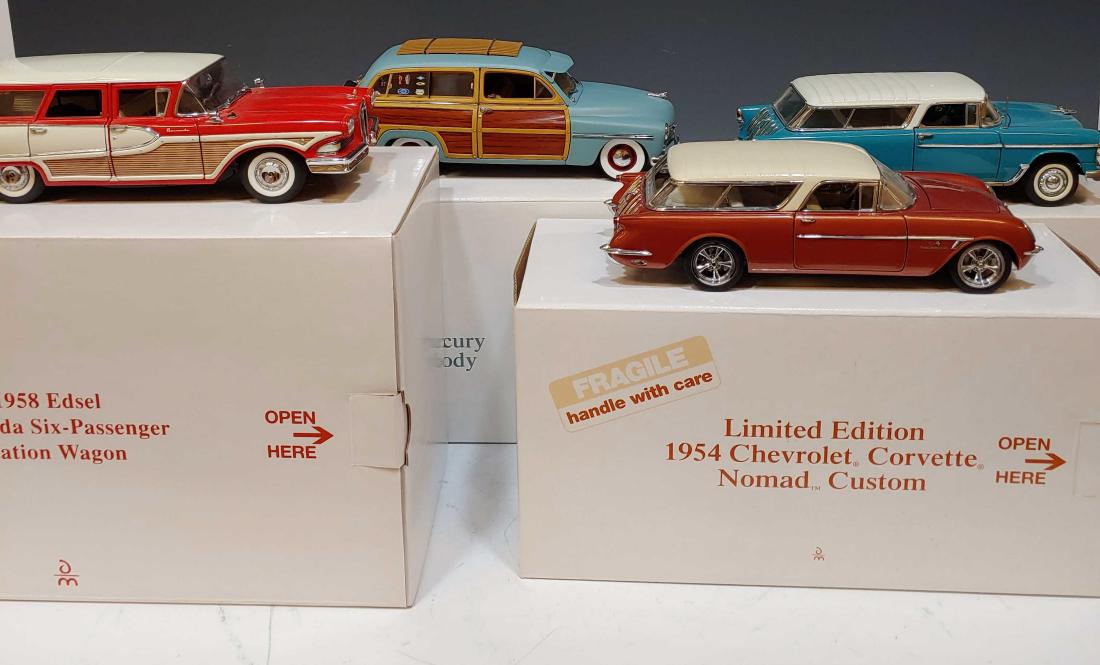 (4) Boxed Danbury Mint GM & Ford Station Wagons: 1958 Edsel Bermuda six passenger, 1949 Mercury Surf Woody, 1955 Chevy Nomad and a Ltd. Ed. 1954 Corvette Nomad Custom. Dimensions are: largest box - 12 3/4 inches long X 7 1/8 inches wide X 5 3/4 inch