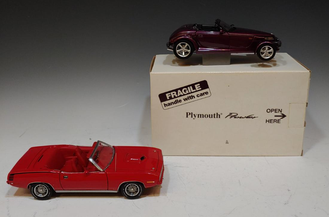 (2) Franklin Mint 1970 Hemi Cuda, Danbury Prowler: 1970 Plymouth Hemi Cuda convertible from Franklin Mint and a Danbury Mint Plymouth Prowler roadster. Dimensions are: largest box - 14 inches long X 6 5/8 inches wide X 6 inches tall. All measurements