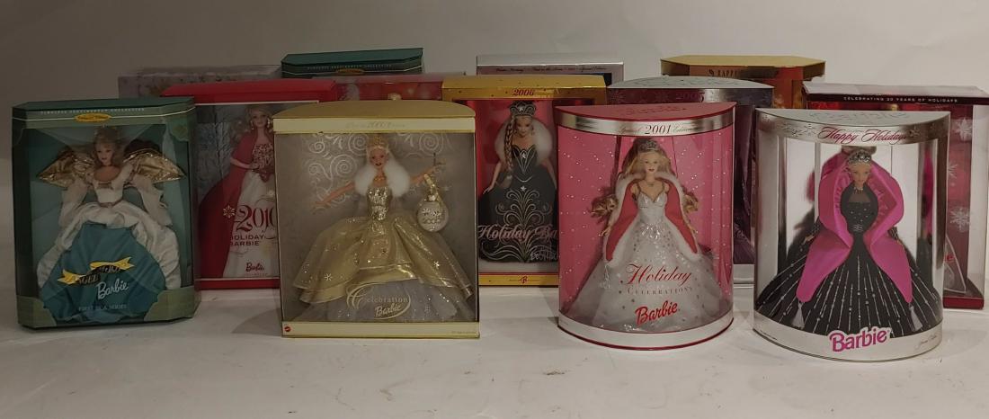 (13) MIB Holiday Barbies Mattel: Includes: a) 2008 Holiday Barbie; b) 2009 Holiday Barbie; c) 2010 Holiday Barbie; d) 1996 Happy Holidays Barbie; e) 2006 Holiday Barbie by Bob Mackie; f) Two 1998 Angel of Joy Barbie from Timeless Sen