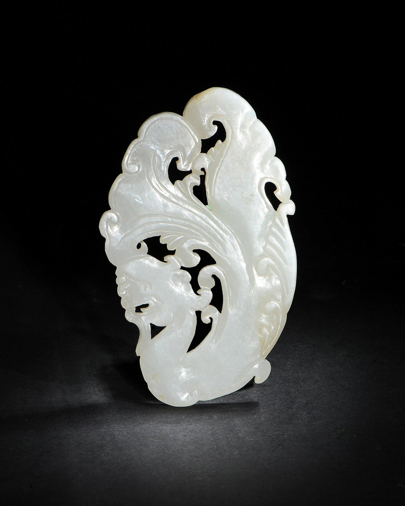 Chinese White Jade Carved Plaque, Ming Dynasty: A Chinese white jade plaque carved with a mythical beast dating from the Ming dynasty. Dimensions are: 3 1/2 inches tall X 2 inches wide. All measurements are approximate. Condition: It is in good con