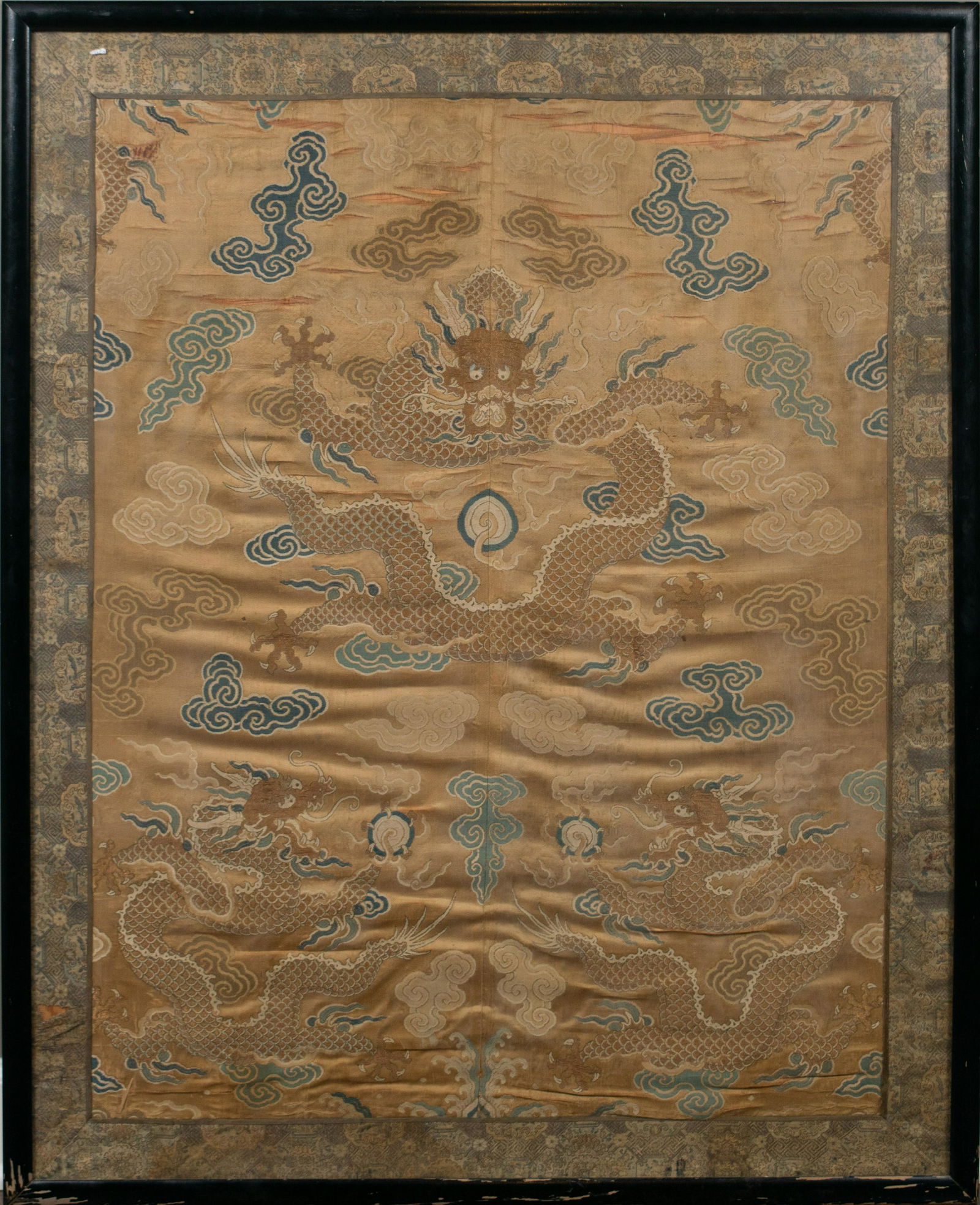 Framed Chinese Dragon Kesi Panel, 18th Century: A framed Chinese kesi panel embroidered with three 5-clawed dragons dating from the 18th century. Dimensions are: 35 inches tall X 27 inches wide while the frame measures 41 1/2 inches tall X 33 1/2 i