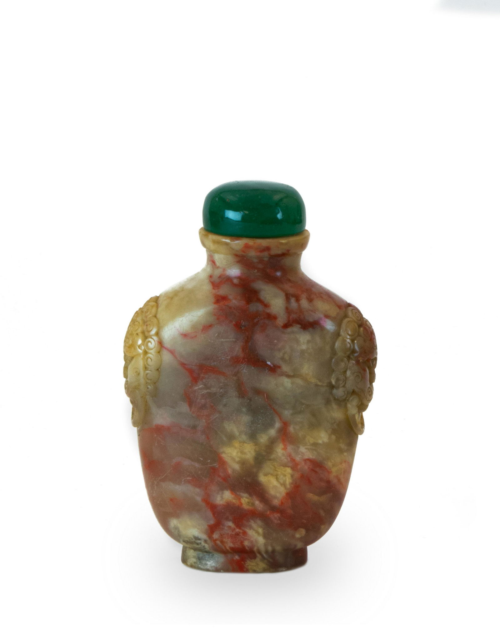 Chinese Soapstone Snuff Bottle with Seal, 18th Century: A Chinese soapstone carved snuff bottle with a 3-character seal on the bottom dating from the 18th century. The snuff bottle has a Peking glass stopper and is carved with guardian lion heads with enga
