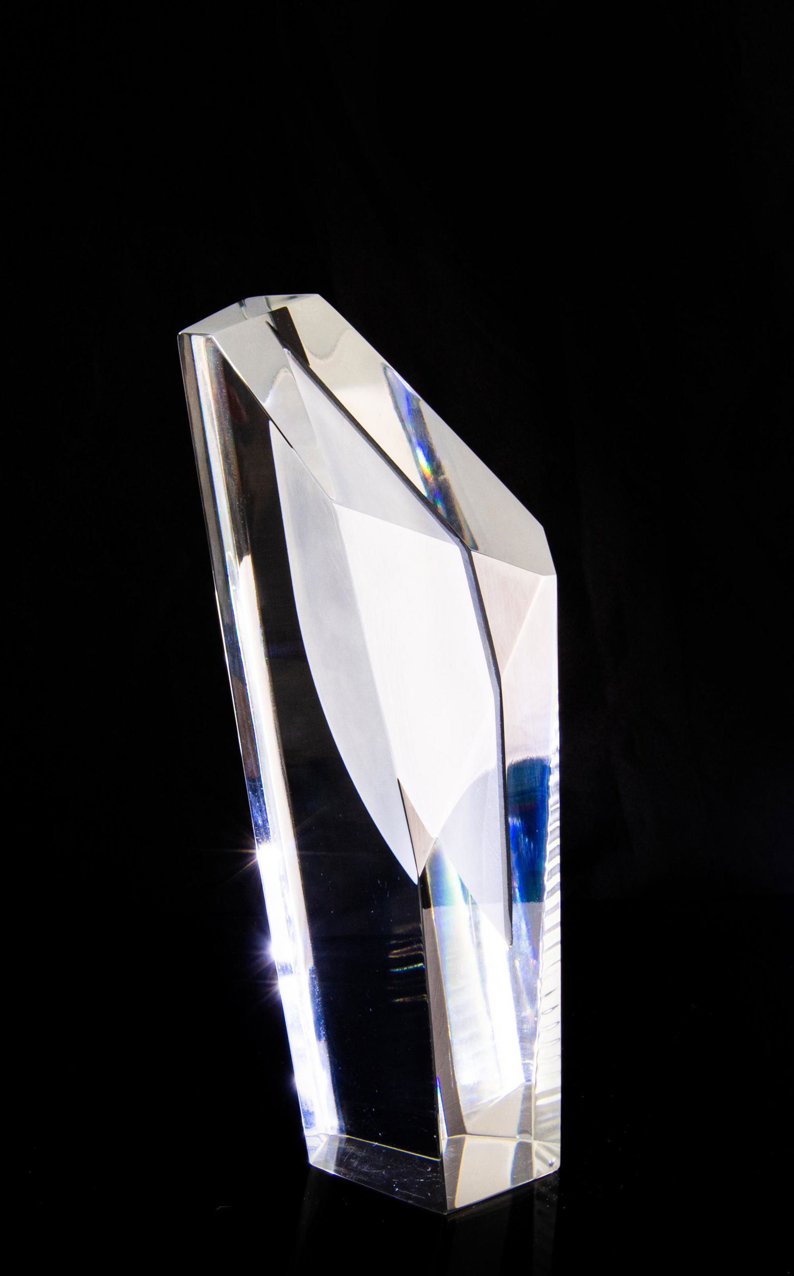 Harvey Littleton Studio Glass Sculpture: Harvey Littleton (American, 20th century) studio glass sculpture. Prismatic, clear glass sculpture with an opaque section in the center. Signed Harvey K Littleton 79 on side. Dimensions are: 2 inches