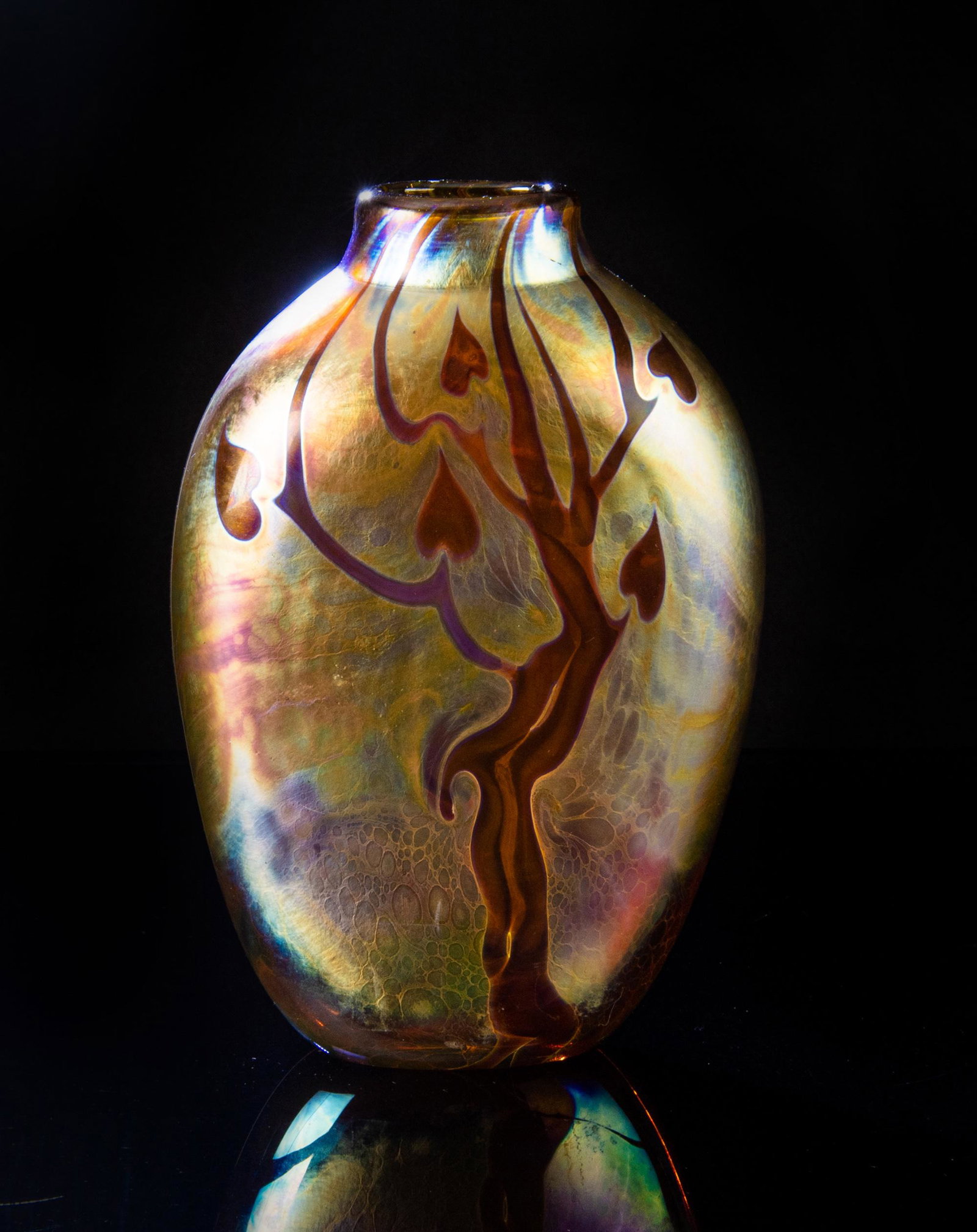 Kent Fiske Fumed Studio Glass Flask: Kent Fiske (American, 20th century) studio glass flask. Flask is in iridescent rose and yellow art glass. Dimensions are: 4 1/8 inches wide X 6 3/8 inches tall X 1 3/4 inches deep. All measurements ar