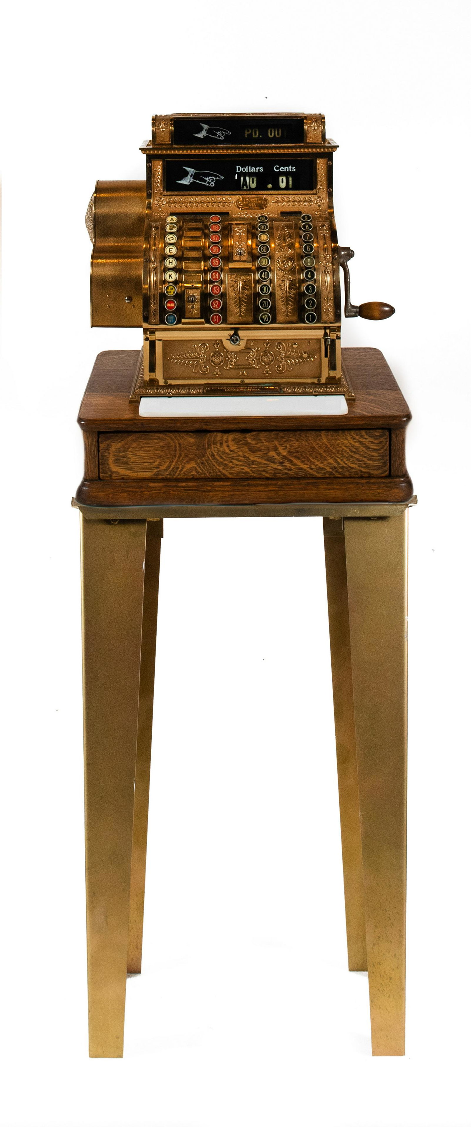 National Cash Register Model 441, Circa 1914: Antique gold-colored cash register by the National Cash Register Co from Dayton, OH, dated 1914. Serial number 1364471; model number 441. Handle crank on right side of register. Dimensions are: 20 inc