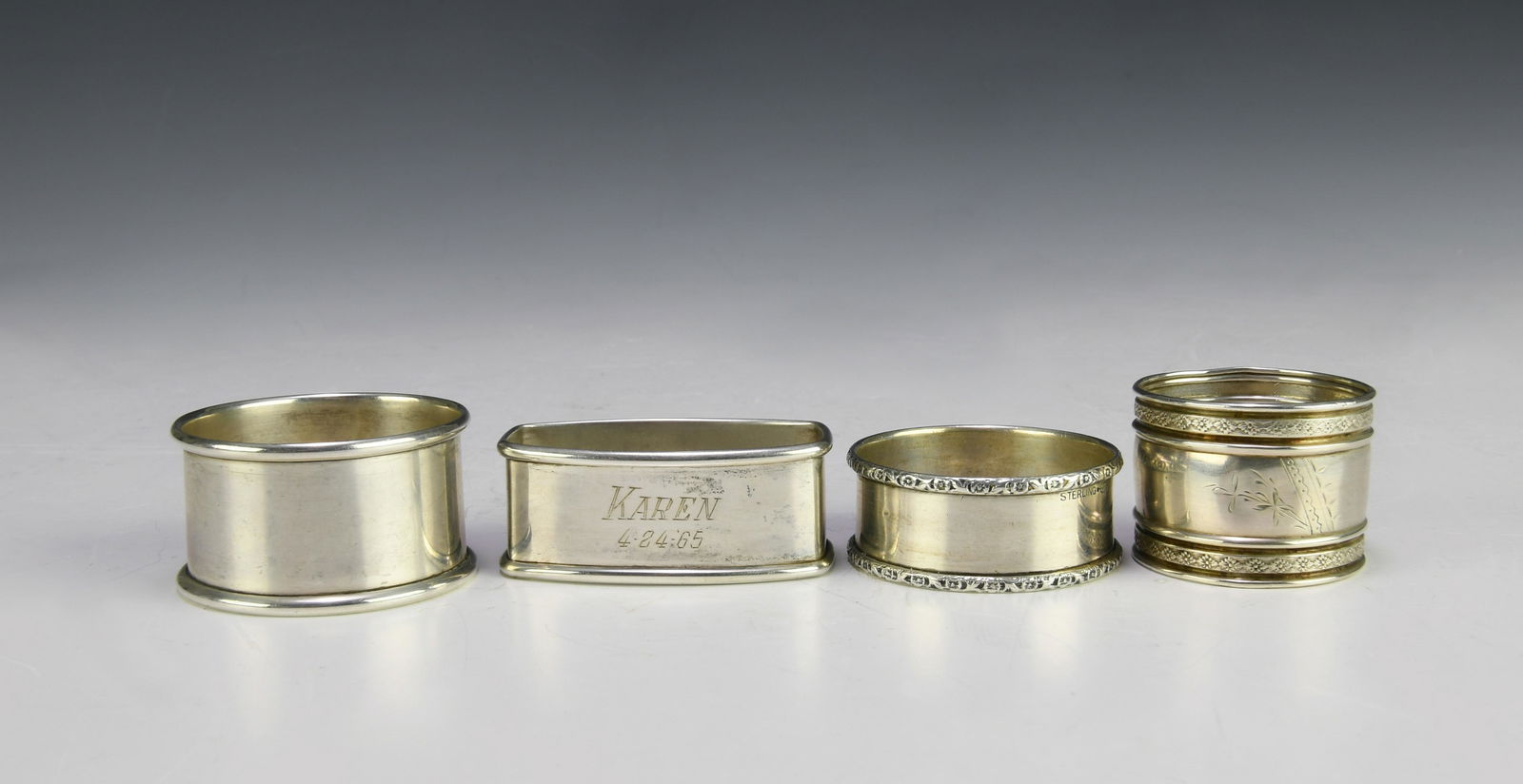 (4) Sterling Silver Napkin Rings: (4) sterling silver napkin rings; a) (2) Navajo silver napkin rings, with mark Webster Sterling and monogram containing letters C, W and arrow (Cathy Webster, Navajo 20th-21st century); b) round sterl
