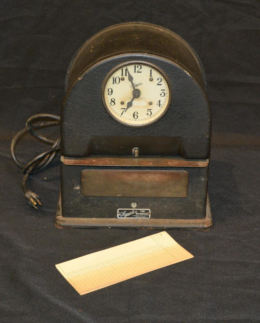 Simplex Time Recorder Co. Time Clock: Simplex Time Recorder Co. time clock. with black hammertone texture finish. Round arch top with front card slot. Dimensions are: 12.625 inches tall X 11 inches wide X 7.25 inches deep; 32.06 cm tall X
