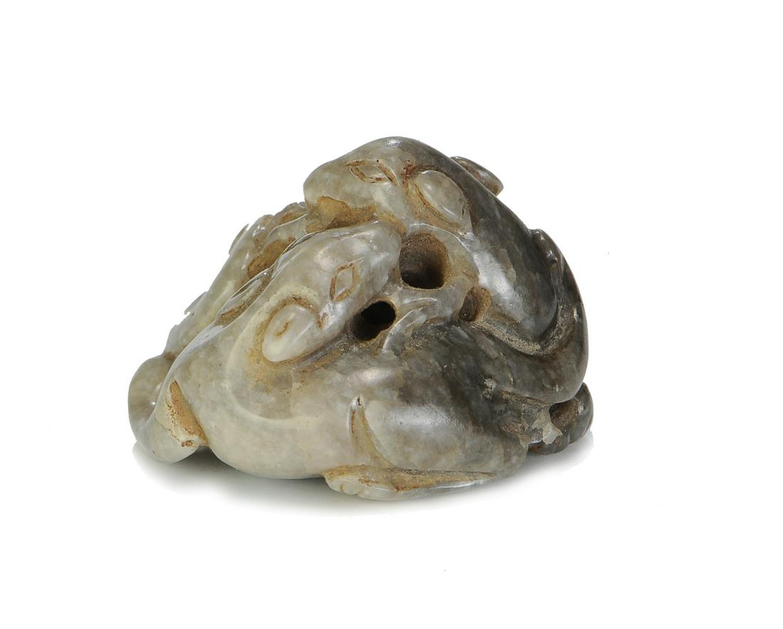 Chicken Bone Jade Carving of 2 Cats, Ming Dynasty: A Chinese chicken bone jade carving of a pair of cats with lingzhi dating from the Ming dynasty. Dimensions are: 3/4 inches tall X 1 1/4 inches wide. All measurements are approximate. Condition: There