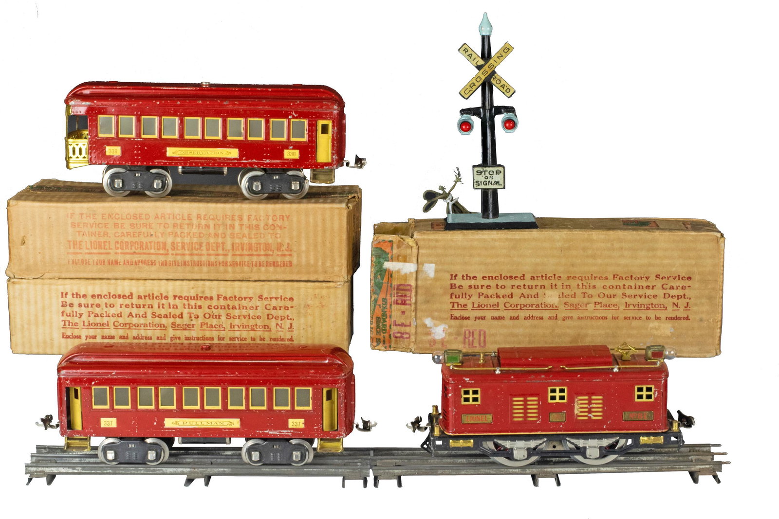 Lionel Standard Gauge 8E, 337, 338 and Track: Lionel standard gauge #8E, #337, #338, and #70 plus pieces of track. Train cars are in original boxes. Track includes Railroad Crossing traffic signal. Dimensions are: cars measure 10 in (25.4 cm) lon