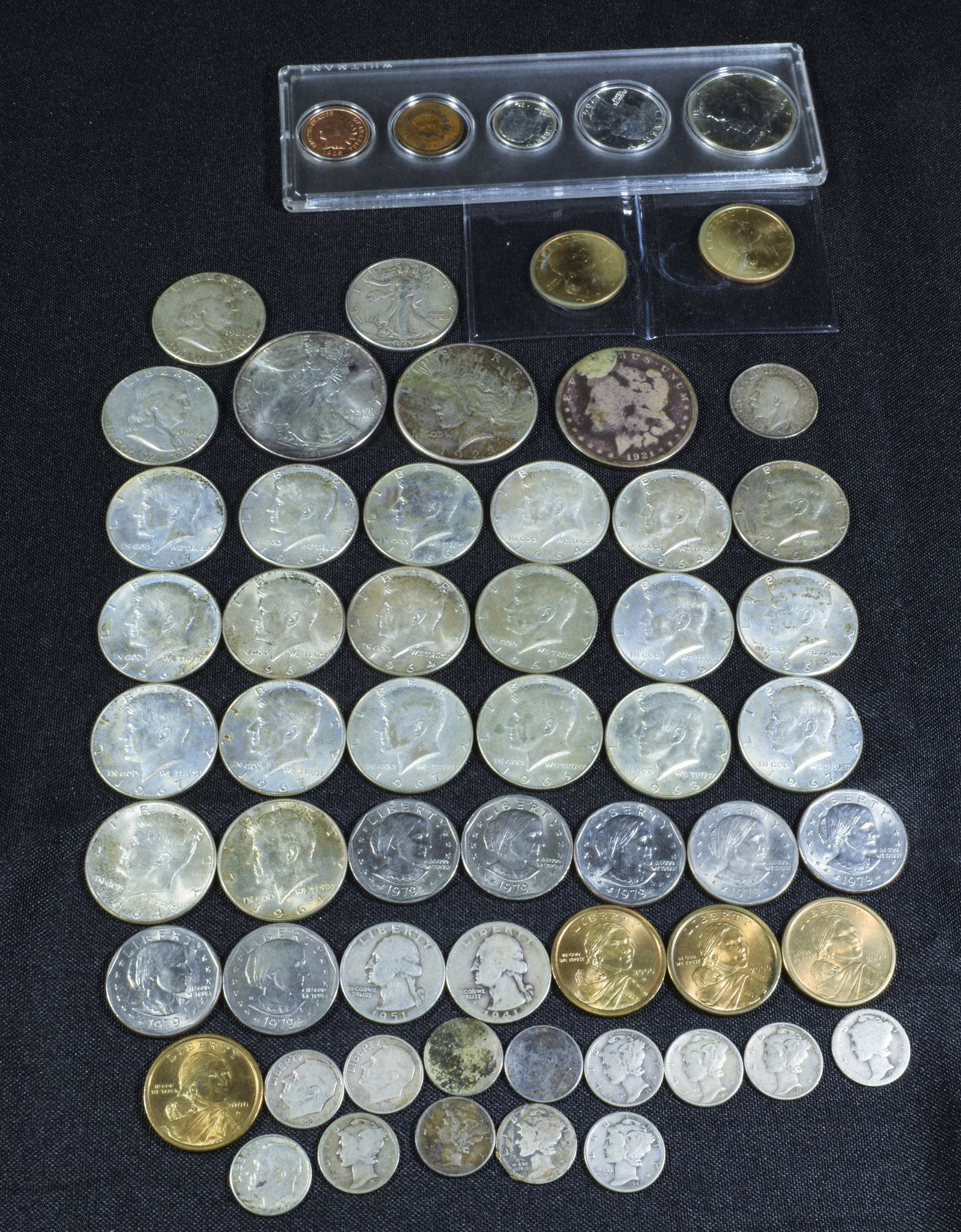 (31) Silver, 14 40% Silver, 13 Sacagawea & Anthony: (31) silver, 14 40% silver, 13 Sacagawea and Anthony (10) silver halves, (4) Washington silver quarters. (3) silver dollars, 1921, 1923 & 1993. (13) silver Mercury and Roosevelt dimes. (1) Silver 1911