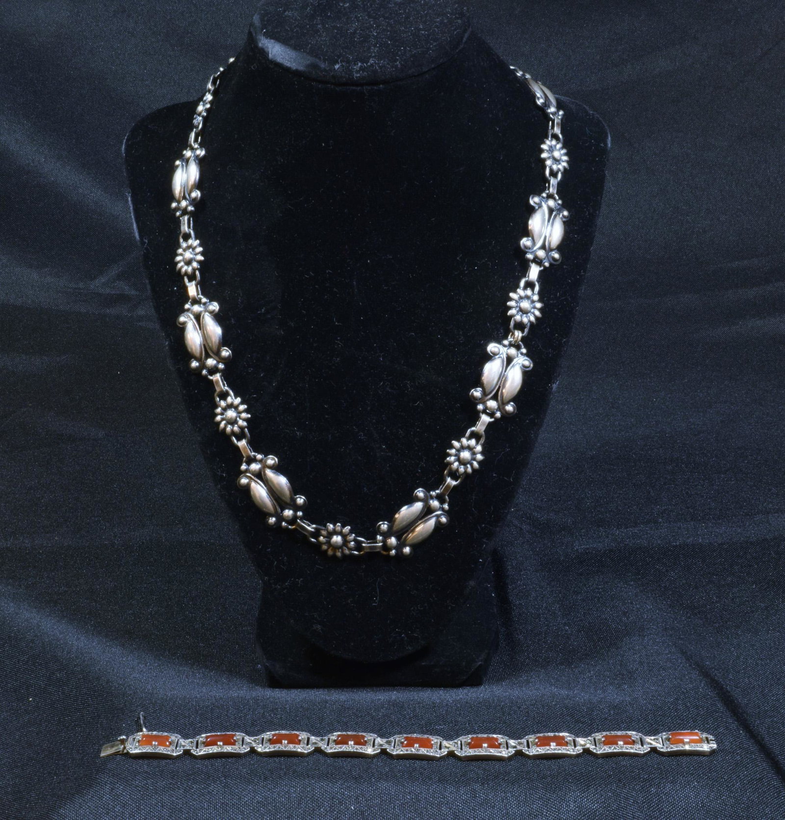 Mid-Century Modern Sterling Necklace & Bracelet: Mid-Century modern sterling necklace and bracelet. Necklace is mid-century modern design, marked sterling. Bracelet with marcasite and carnelian, unmarked but is sterling. Dimensions are: 21 1/4 in (5