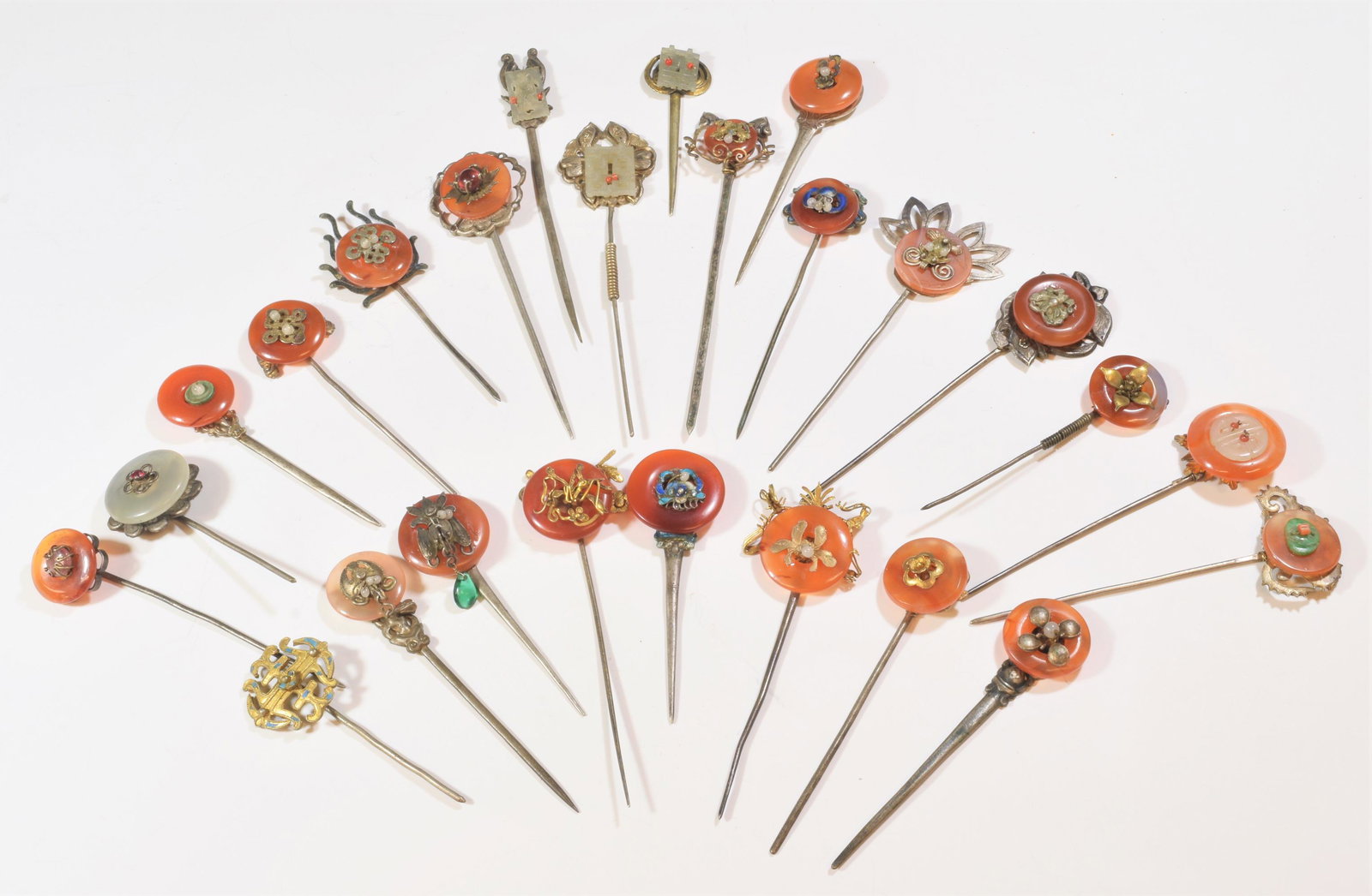 25 Chinese Silver, Jadeite, Agate Hairpins 19th C: (25) 19th Century Chinese silver, jadeite, agate hairpins: collection of hairpins of various sizes and designs. Weight: 200 grams (6.40 ozt) Dimensions are: smallest- 2 1/2 in (6.4 cm) tall X 3/4 in (
