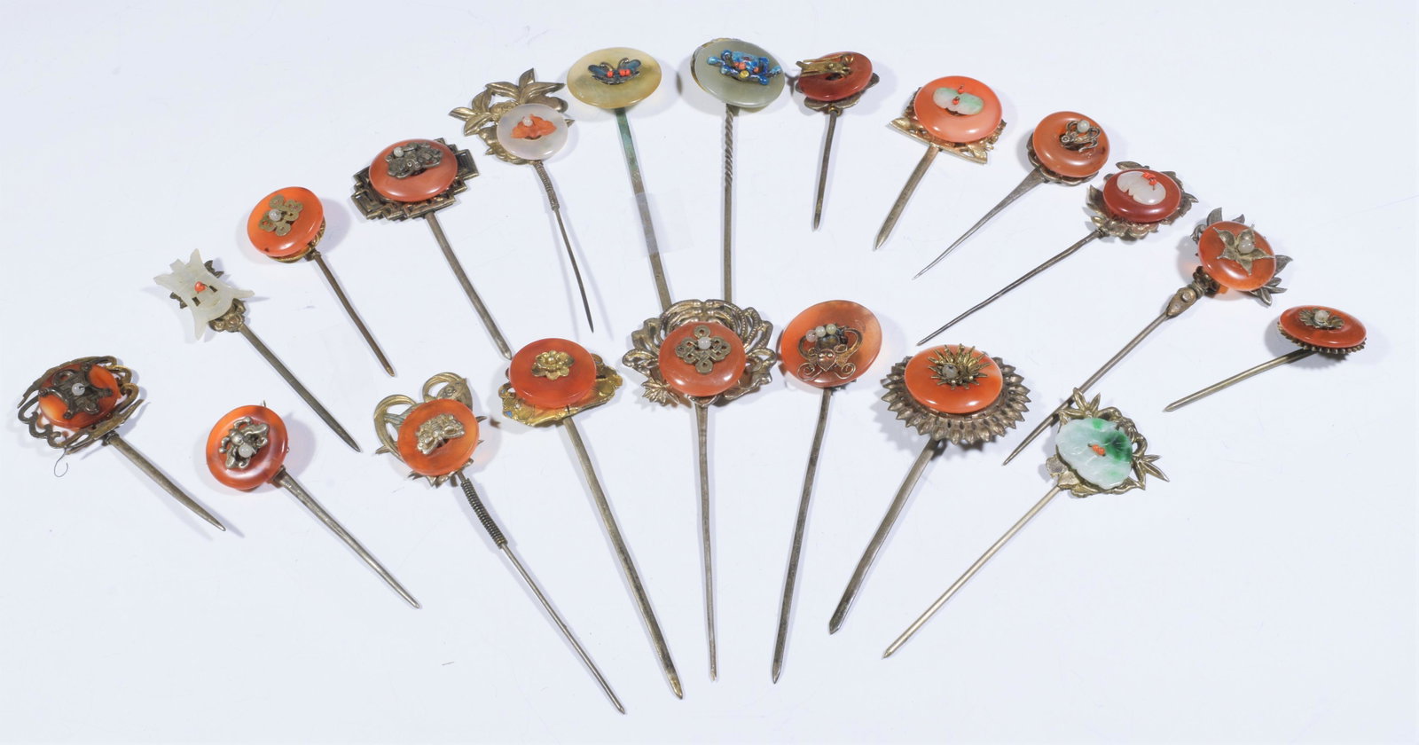 20 Chinese Silver, Jadeite, Agate Hairpins 19th C: (20) 19th Century Chinese silver, jade, agate hairpins: collection of hair pins of various sizes and designs. Weight: 174.1 grams (5.74 ozt). Dimensions are: smallest- 2 1/4 in (5.7 cm) tall X 1 in (2