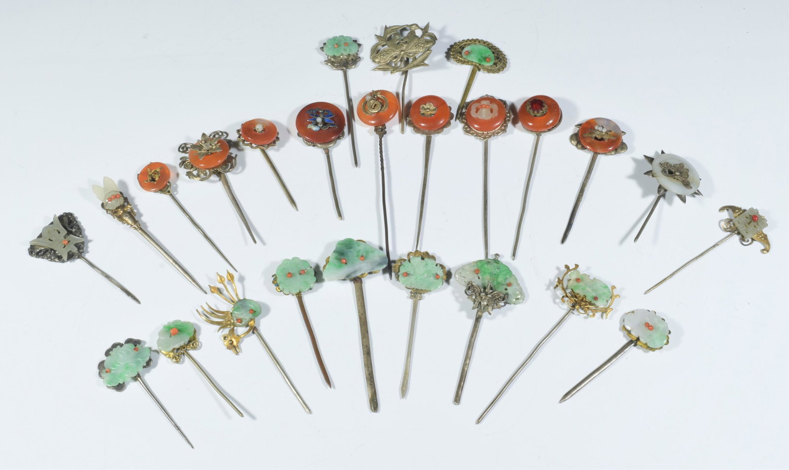 25 Chinese Silver, Jadeite, Agate Hairpins 19th C: (25) 19th century Chinese silver, jadeite, agate hairpins: collection of hairpins of various sizes and designs. Weight: 163.7 grams (5.26 ozt). Dimensions are: smallest- 2 1/4 in (5.7 cm) tall X 1 in 