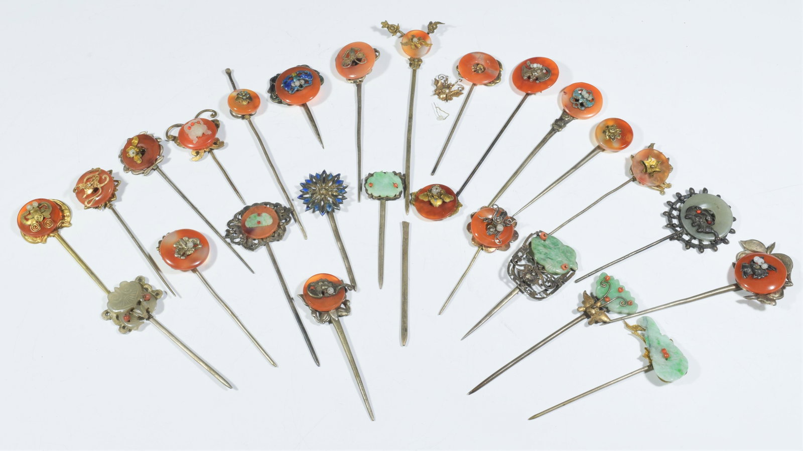 26 Chinese Silver, Jadeite, Agate Hairpins, 19th C: (26) 19th Century Chinese silver, jadeite, agate hairpins: collection of hair pins of various sizes and designs. Weight: 192.9 grams (6.2 ozt). Dimensions are: smallest- 2 1/2 in (6.3 cm) tall X 1 1/4