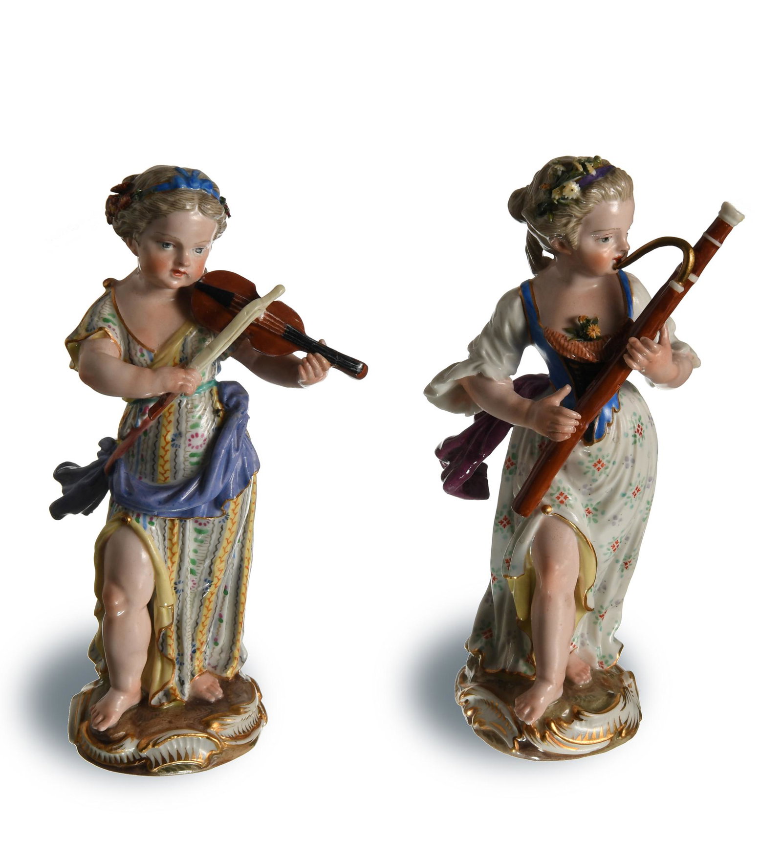 Meissen, 2 Maiden Musicians, Models 2565 & 2981: Meissen (German, founded 1710) porcelain. Both are designed by Johann Joachim Kaendler, and feature a maiden playing a violin and another playing a bassoon. Both are stamped with the Meissen mark and 