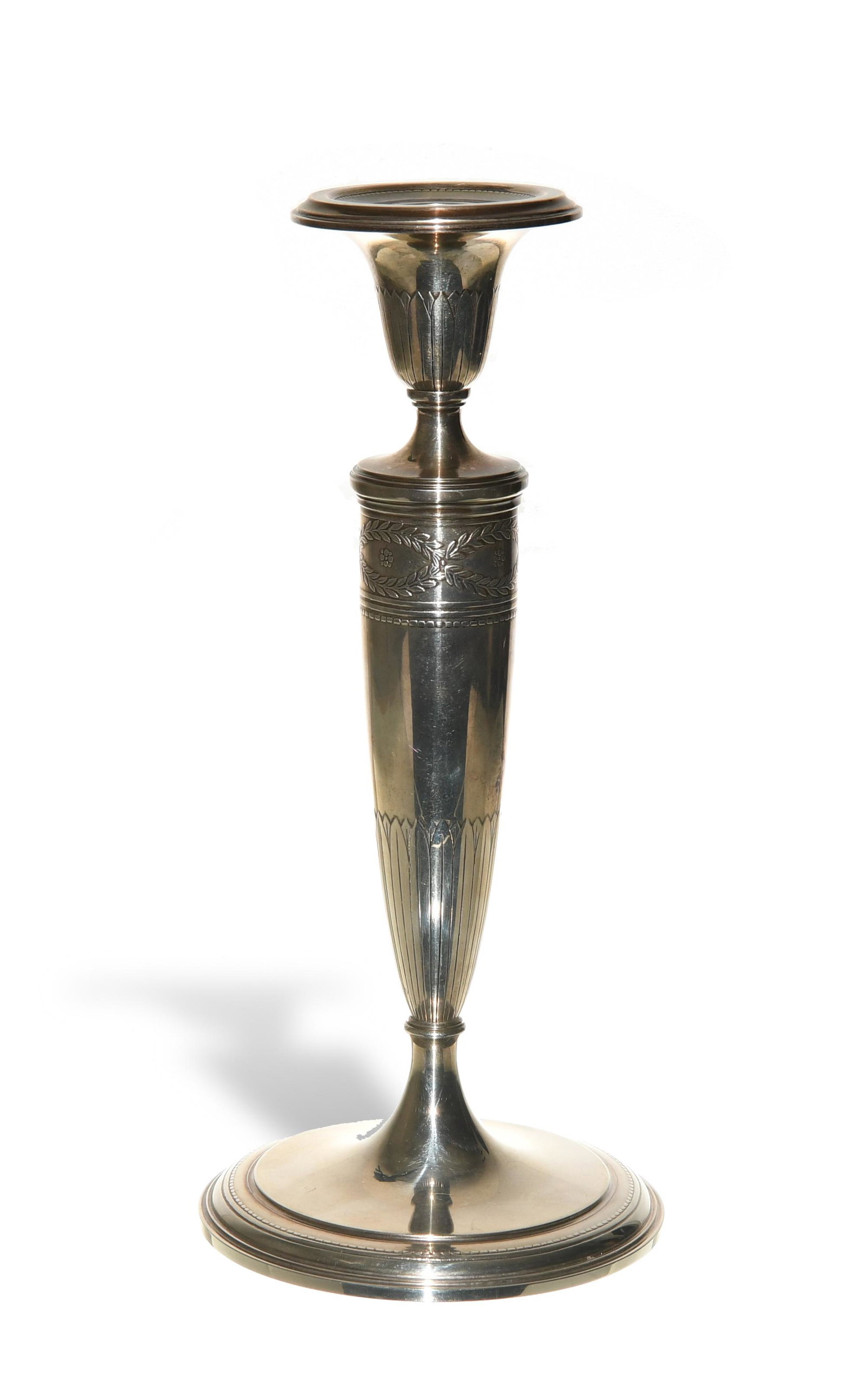 Tiffany & Co., Sterling Silver Candlestick: Tiffany & Co. (American, founded 1837) sterling silver. Single candlestick featuring a leaf decoration. It is incised with the makers mark, pattern number, '14445,' '925-10000,' and '17' on the base, 