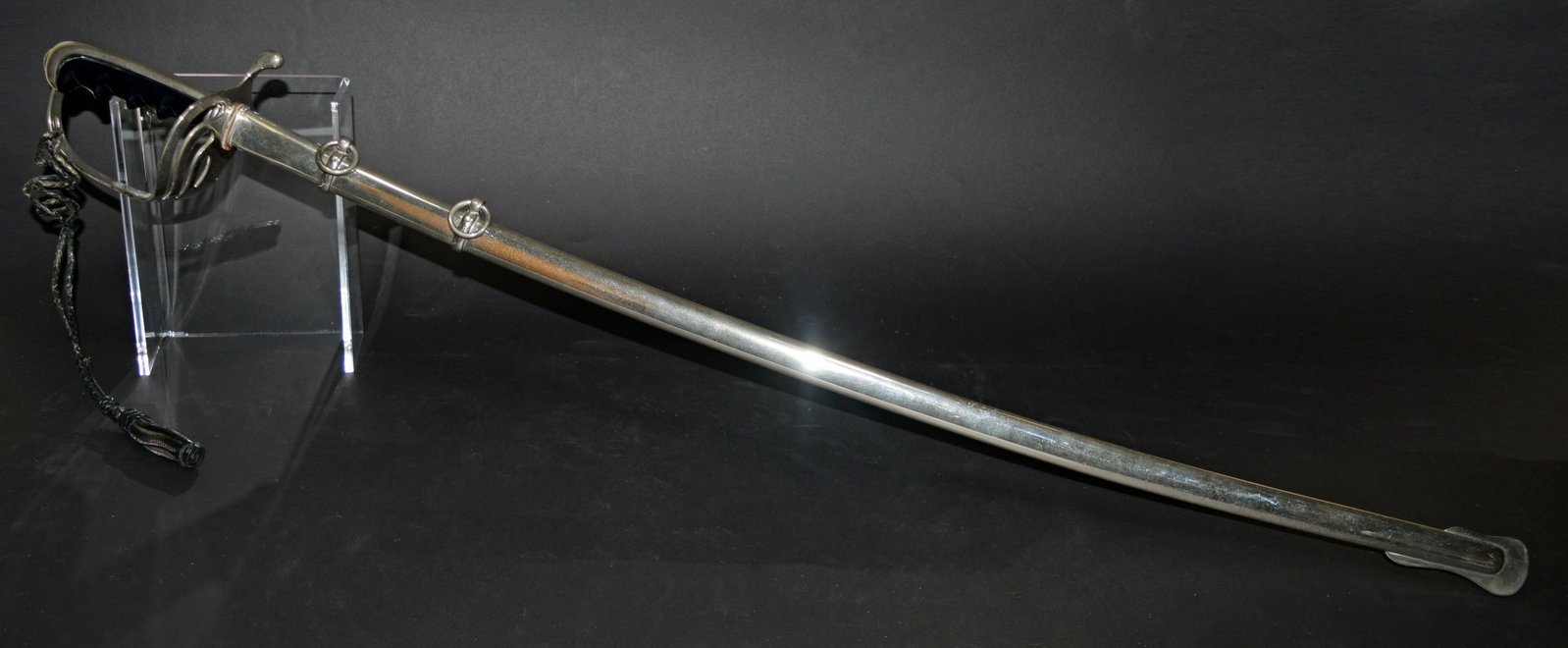 U.S. M1902 N.S. Meyer Spartan Etched Dress Sword: A dress sword with etched blade, retains period leather sword knot. Dimensions: 38 1/2 inches long; 97.8 cm long. Blade- 31 3/4 inches long; 80.6 cm long. All measurements are approximate.