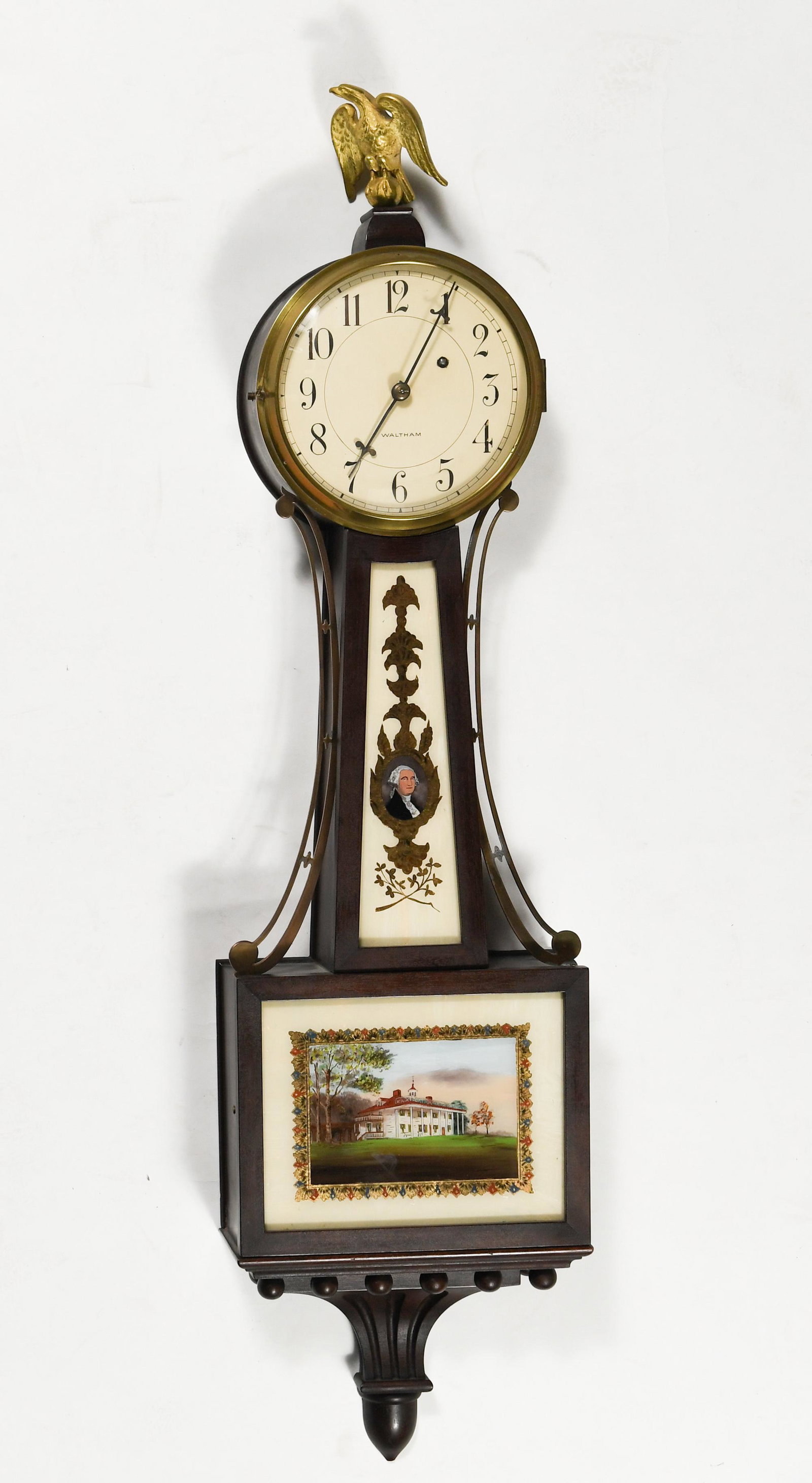 Waltham 'Willard' Banjo Clock: Waltham Clock Company (American, 1911) 'Willard'-style model No. 31. Featuring reverse-painted images of George Washington and Mount Vernon. Accompanied by a bottle of W.F. Nye Superior Clock oil dati