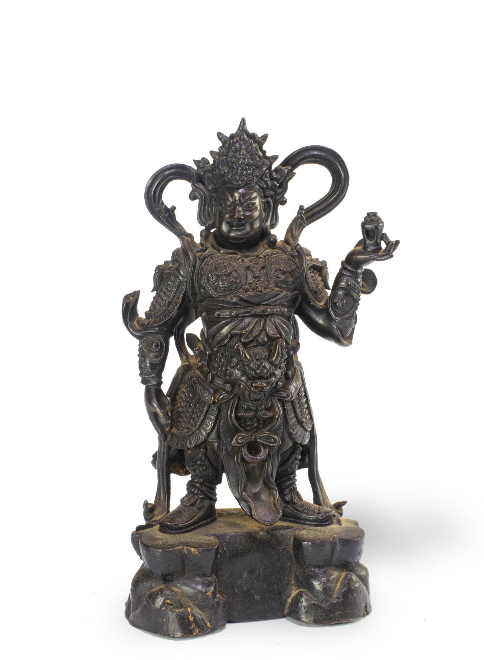 Chinese Bronze Guardian Statue, Ming: A Chinese bronze statue of a guardian figure dating from the Ming dynasty. The figure holds a small vessel in 1 hand. Dimensions are: 14 inches tall X 7 inches wide; 35.6 cm tall X 17.8 cm wide. All m