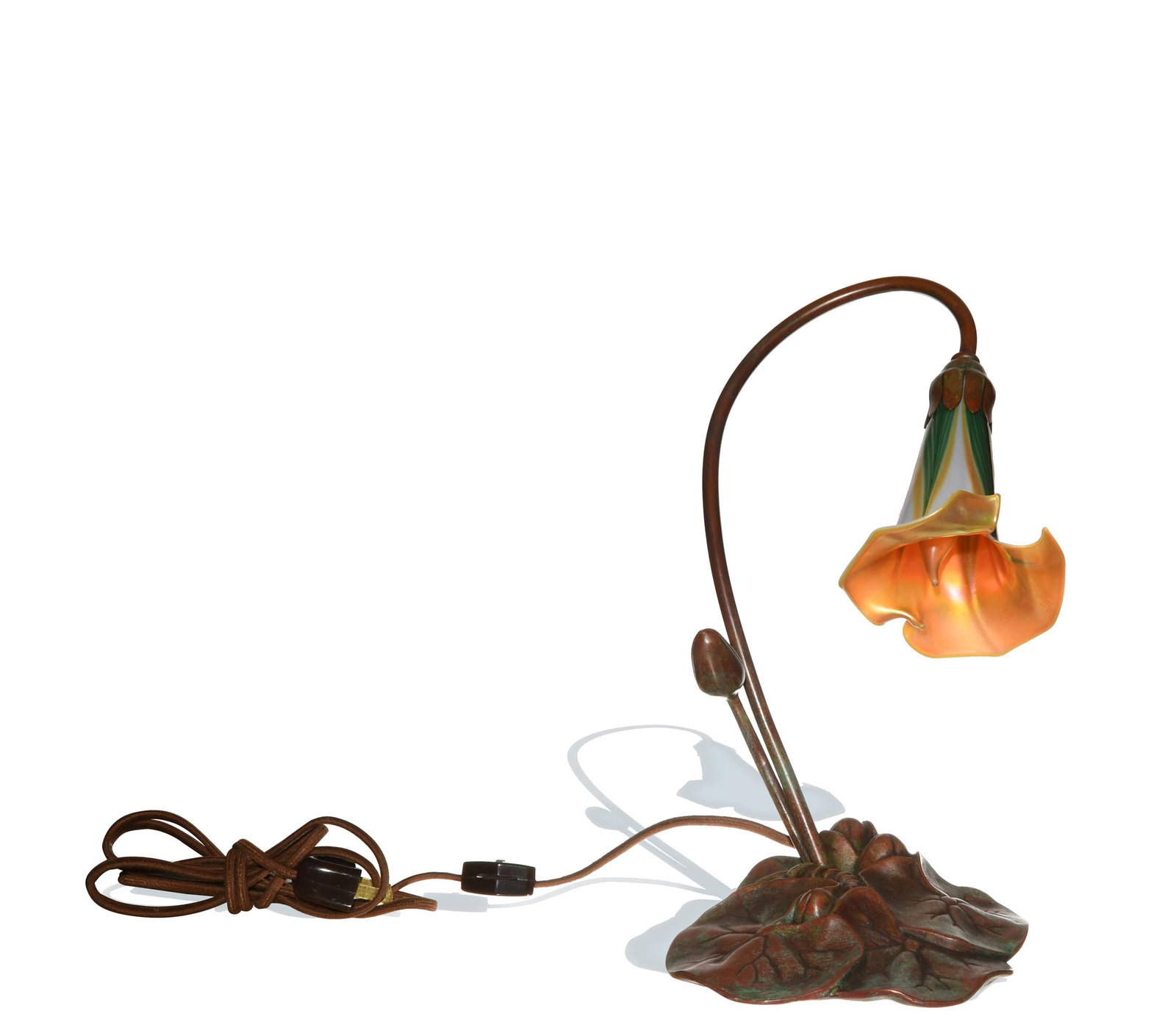 Tiffany Studios, Lily Lamp: Tiffany Studios (American, 1878-1933) bronze and glass. The base of the lamp is marked 'Tiffany Studio,' the green-and-gold shade is an unusual shape variation and is marked 'L.C.T. Favrile 20-B' and 